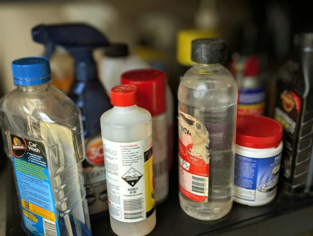 A bunch of bottles are sitting on a shelf