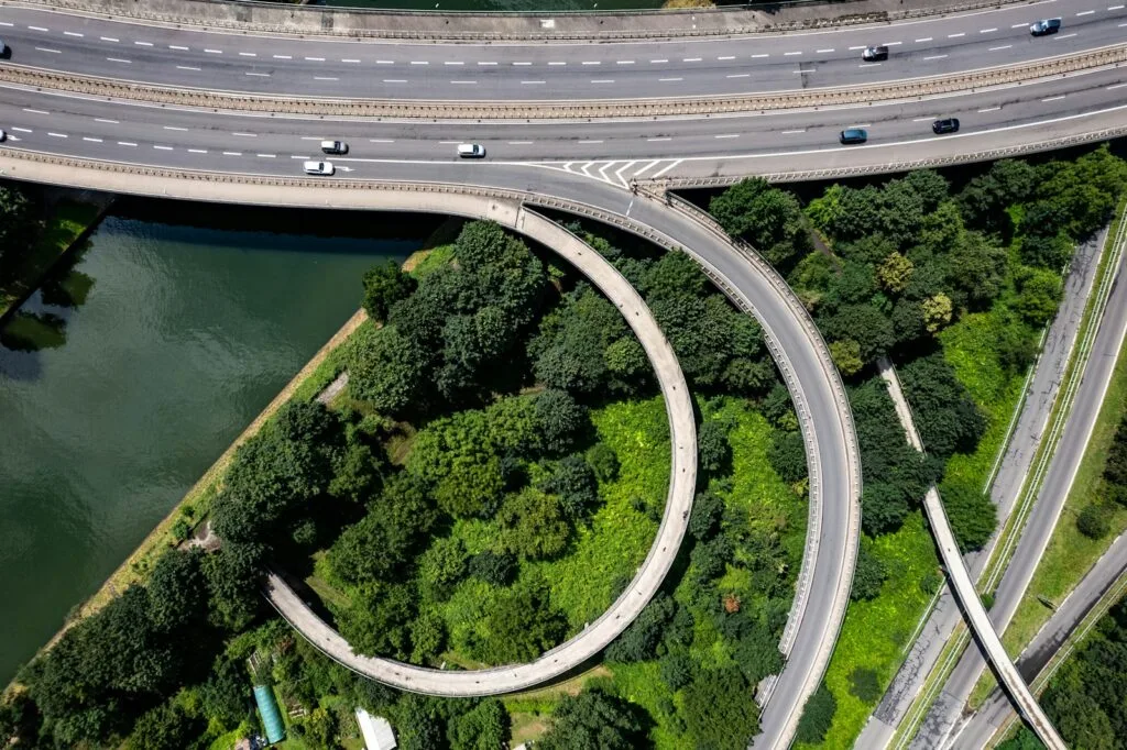 An aerial view of a highway intersection in a city